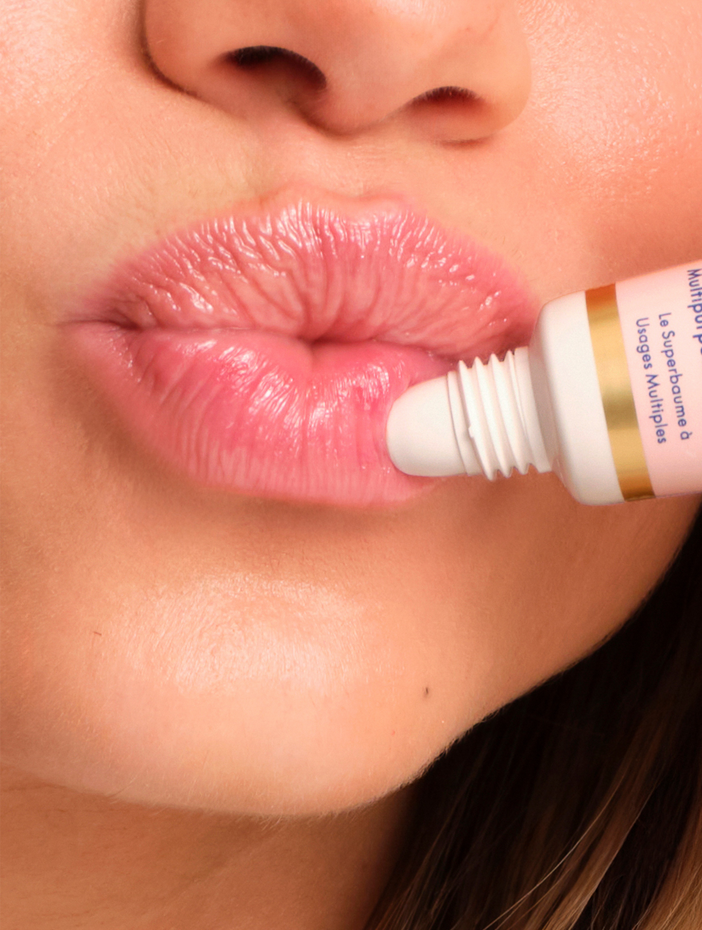 Close up shot of the Lanolips Original 101 Ointment Multipurpose Superbalm applied on lips. Award-winning, dermatologically tested, ultra-pure grade lanolin lip balm with 101 multipurpose uses.