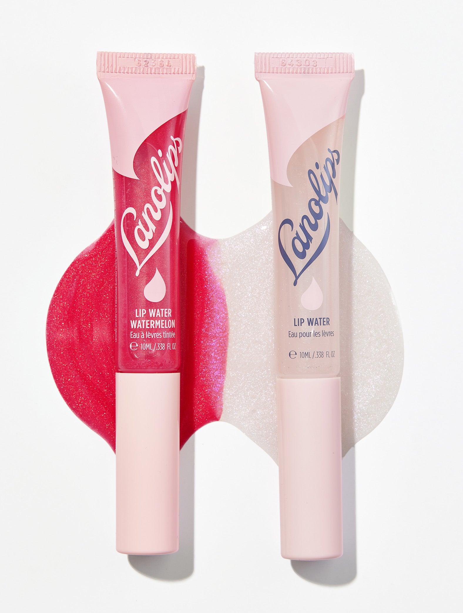 Two of the shades in the Lanolips Lip Water Collection - Original and Watermelon. Made with liquid lanolin, hyaluronic acid, natural flavors and holographic shimmer to make your lips glow.