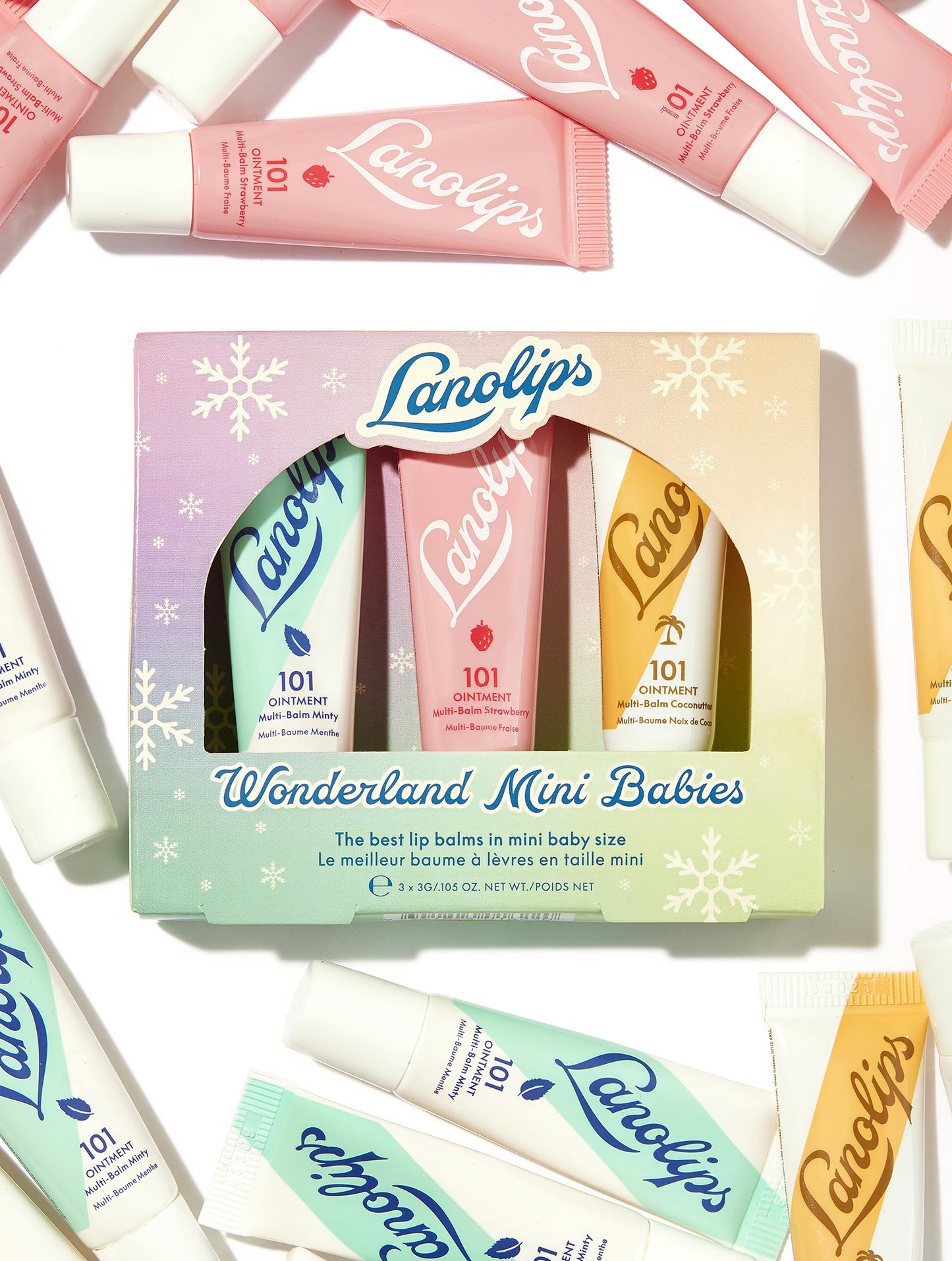 Lifestyle shot of the Lanolilps Wonderland Mini Babies. Made with the richest lanolin, vitamin E and natural flavors, these lip balms provide 24 hour hydration.