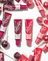 Lanolips glossybalms tubes in berry and candy.