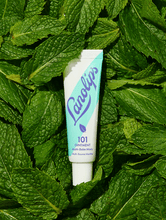Lanolips 101 Ointment Multi-Balm in Minty  | Load image into Gallery viewer, Lanolips 101 Ointment Multi-Balm in Minty. We have taken our iconic Original 101 Ointment and infused it with peppermint + spearmint oils &amp; vitamin E.
