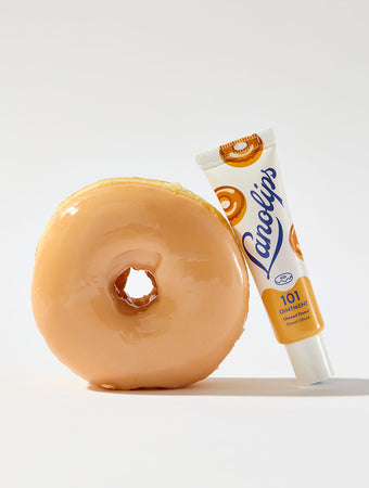 Lanolips' 101 Ointment Multi-Balm Glazed Donut is infused with vitamin E & all-natural donut flavor so you can experience the bliss of sinking your teeth into a glazed donut with every swipe.