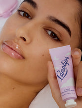 Lanolips 12 Hour Overnight Lip Mask - Squeezed | Load image into Gallery viewer, Model holding up Lanolips 12 Hour Overnight Lip Mask
