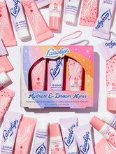 Hydrate + Dreams Minis - 101 Ointment Strawberry, 12 Hour Overnight Lip Mask & 101 Ointment Raspberry Shortcake in a cute mini size. | Load image into Gallery viewer, Lanolips Hydrate + Dream Minis is a trio of our 3 best-selling products at Lanolips. Each pack contains a mini tube of 101 Ointment Raspberry Shortcake, 101 Ointment Strawberry for hydration, and a mini tube of 12 Hour Overnight Lip Mask, containing powerhouse ingredients vitamin c, hyaluronic acid and ceramides boost lip recovery overnight softening, strengthening and replenishing lips while you sleep.
