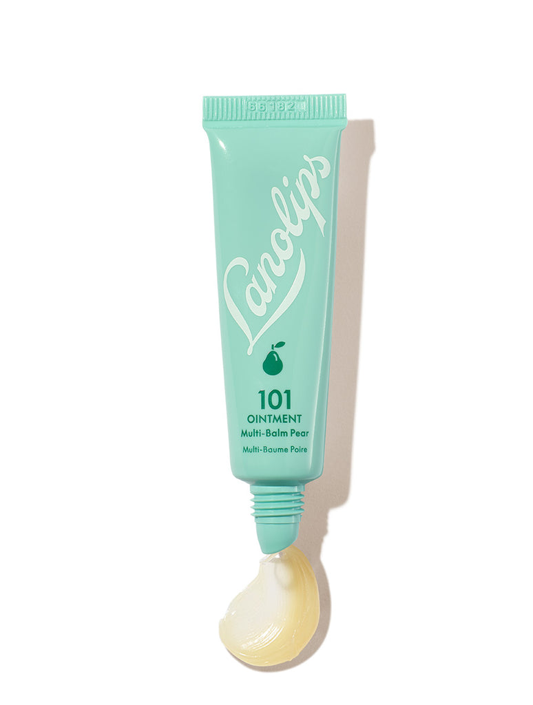 Lanolips 101 Ointment Multi-Balm Pear in a soft mint-green squeezable tube with a white cap. The packaging features the Lanolips logo in elegant white lettering and a small pear icon. A dollop of the rich, glossy balm is visible at the opening, showcasing its hydrating texture. Infused with lanolin and pear extract, this multi-purpose balm deeply moisturises and softens lips and skin while delivering a fresh, subtly sweet pear scent.