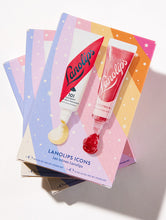 Lanolips Icons Duo comes in our best selling 101 Ointment Watermelon and Glossy Balm Candy. | Load image into Gallery viewer, Lifestyle shot of the Lanolips Icons Duo - containing 101 Ointment Watermelon and Glossy Balm Candy.
