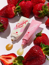 Lanolips Lip Rituals Scrub & Balm Duo Set with Lip Scrub Strawberry and 101 Ointment Multi Balm Strawberry. | Load image into Gallery viewer, Lanolips Lip Rituals Scrub &amp; Balm Duo Set Tube Packaging with Lip Scrub Strawberry and 101 Ointment Multi Balm Strawberry.
