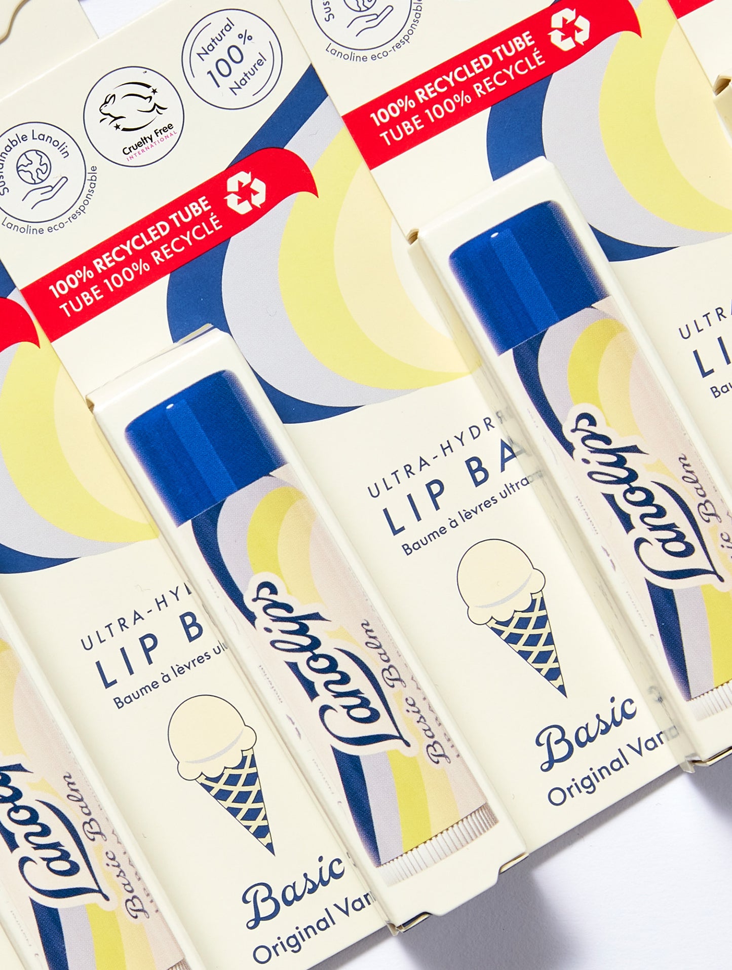 Lanolips Basic Balm Original Vanilla lip balm tubes with ice cream cone design on a white background