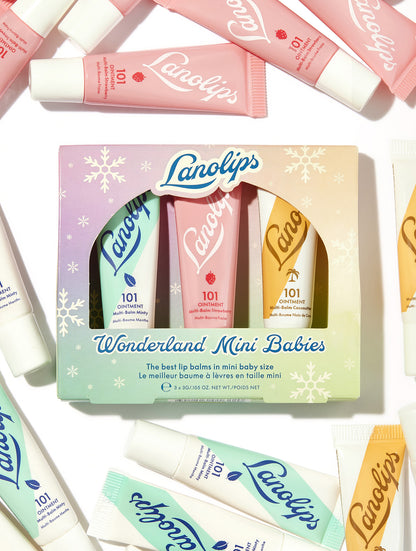 Lifestyle shot of the Lanolilps Wonderland Mini Babies. Made with the richest lanolin, vitamin E and natural flavors, these lip balms provide 24 hour hydration. 