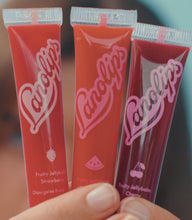 Fruity Jellybalm Cherry: Our 101 Ointment now has added cherry fruity extracts. | Load and play video in Gallery viewer, Video of Lanolips Jellybalms comes in three fruity flavors: Cherry, Strawberry and Watermelon
