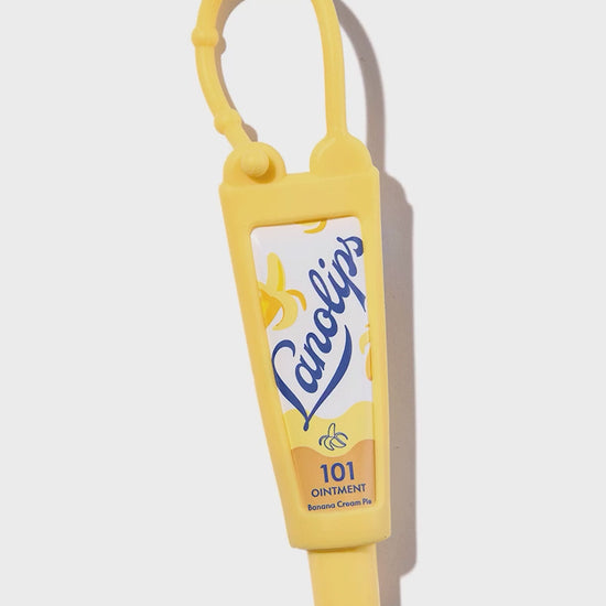 Lanolips Yellow Key Ring. This key ring is refillable with your favorite Lanolips tube in 9g, 10g, or 12.5g sizes (sold separately).