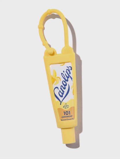 Lanolips Yellow Key Ring. This key ring is refillable with your favorite Lanolips tube in 9g, 10g, or 12.5g sizes (sold separately).