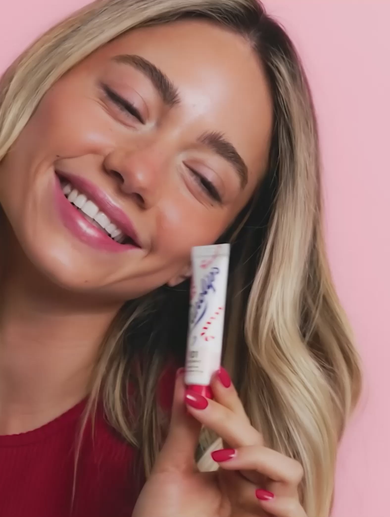 Video of model using the Lanolips 101 Ointment Multi-Balm Candy Cane, a limited edition festive gourmand flavor. 