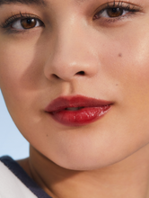 Tinted Balm Spice | Load image into Gallery viewer, Tinted Lip Balm in Spice gives you holiday-wine-stained lips - with the hydration instead of the hangover.
