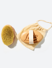 Lanolips' Dry Body Brush | Load image into Gallery viewer, The Lanolips Dry Body Brush comes in a cotton bag

